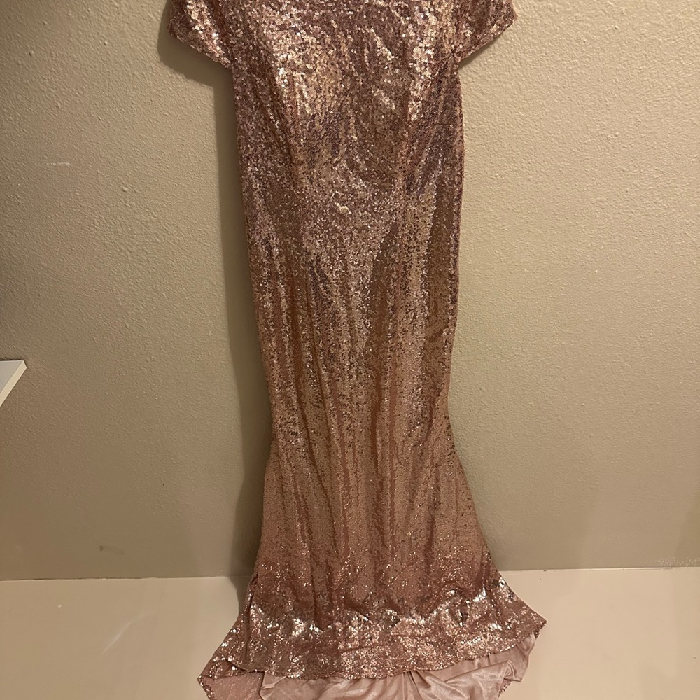 Beautiful rose gold sequin gown with train
